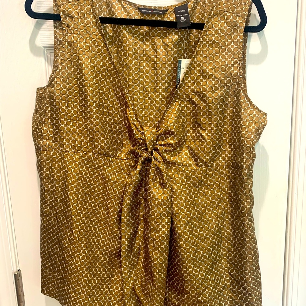 Brand new beautiful silk  top size 16